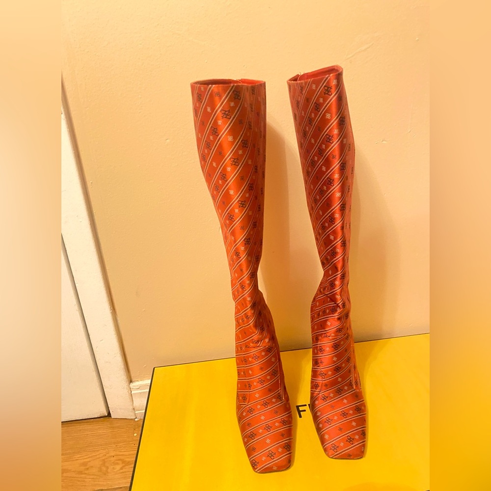Red satin Karligraphy boots by Fendi